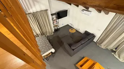 an overhead view of a living room with a couch and a table at Casa Rosa Sal in Santa Maria