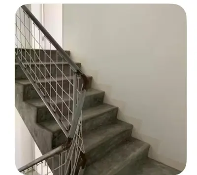a set of stairs with a metal hand rail at Modern&Central Mindelo - 2A in Mindelo