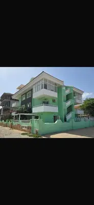 a large green building with aventh floor at WIND Ocean View Lobster Dinner Included in Santa Maria