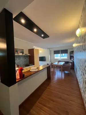 a living room with a kitchen and a dining room at WIND Ocean View Lobster Dinner Included in Santa Maria