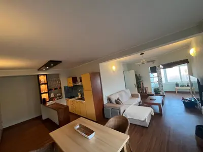 a living room with a couch and a table at WIND Ocean View Lobster Dinner Included in Santa Maria