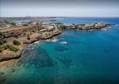 an aerial view of a beach with blue water at Prainha Beach Home in Praia