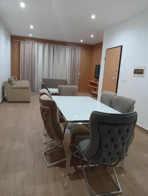 a conference room with a table and chairs at T&S Guest House in Praia