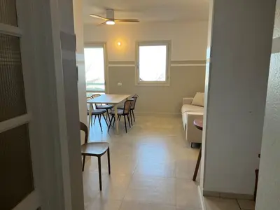 a room with a table and chairs and a dining room at Extraordinary sea view in Sal Rei