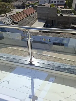 a metal rail on top of a glass window at Casa do Céu Azul in Tarrafal