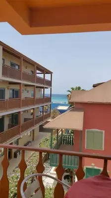 a balcony of a building with the ocean in the background at Holiday Properties Oleandro Ocean in Santa Maria
