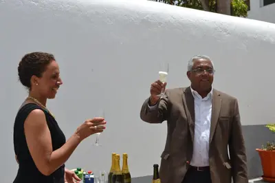 a man and a woman holding glasses of wine at Hotel Cruz Grande-Brava in Vila Nova Sintra