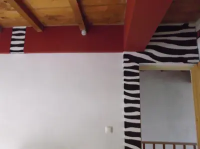 a room with black and white stripes on the wall at Misurino in Paul