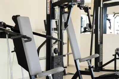 a gym with a treadmill and a mirror at Occidental Boa Vista Beach in Rabil