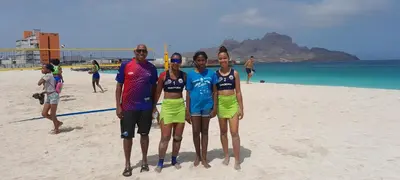 a group of people standing on a beach at Laginha Beach Guest House in Mindelo