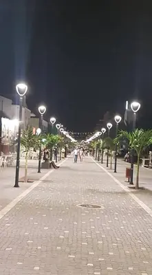 a street at night with a bunch of street lights at Sal Apartments Djadsal Moradias in Santa Maria
