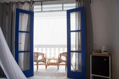 an open door to a dining room with a table at Nos Kasa in Sal Rei