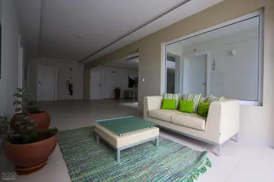 a living room with a couch and a coffee table at Tiduca Hotel in Ponta do Sol