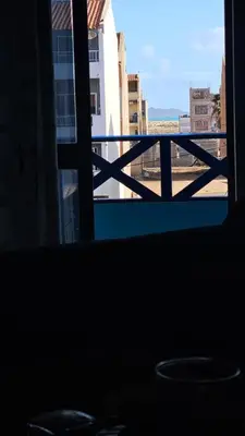 a view from a window with a view of a building at Casa Azul One Rua da Morna Santa Maria in Santa Maria