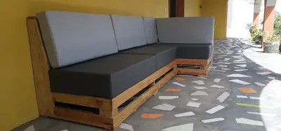 a bench sitting on top of a floor at casa alcindo in Portela