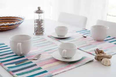 a table with three cups and saucers on it at Ca Marta Penthouse in Sal Rei