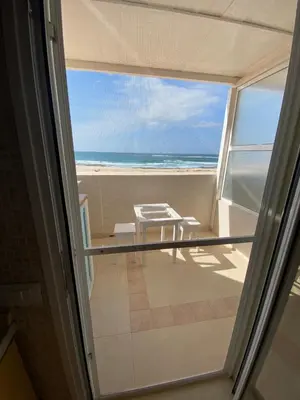 a balcony with a view of the ocean at Vista Do Mar Sea View WI-FI FREE Sal Rei in Sal Rei