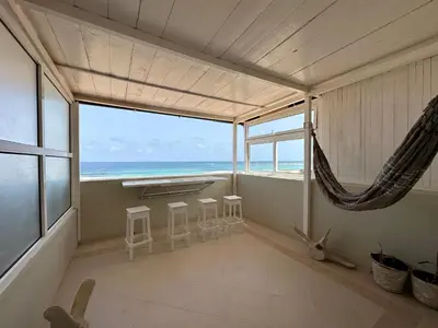 a living room with a view of the ocean at Vista Do Mar Sea View WI-FI FREE Sal Rei in Sal Rei