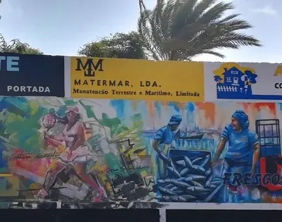 a mural on the side of a wall in a city at Private Apartament Celestina & Carlos in Mindelo