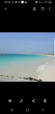 a screen shot of a beach with the ocean at Surf Beach Vila Verde apartments in Santa Maria
