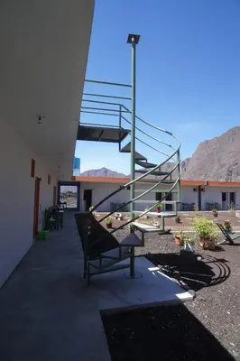 a stair case in a building with a bench at Casa Marisa 2.0 in Portela