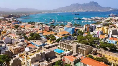an aerial view of a city with a harbor at T1 Família Luz in Mindelo