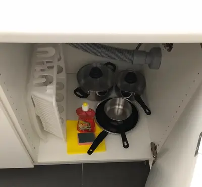 a kitchen stove with pots and pans on it at Morabezahome in Mindelo