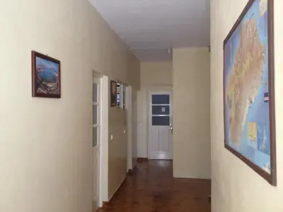 a hallway with a large map on the wall at Sissi's B&B in Ponta do Sol