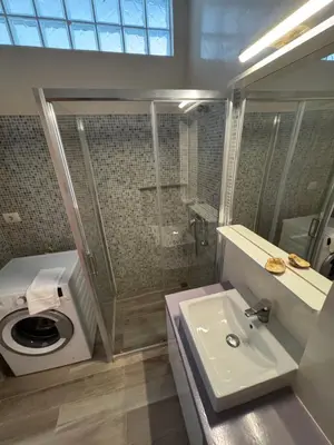 a bathroom with a shower and a toilet and a sink at KA ANGELA, WI-FI FREE Praia Cabral, Sal Rei in Sal Rei
