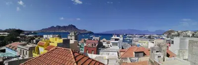 a view of a city with buildings and the water at Residencial Casa da Luz in Mindelo