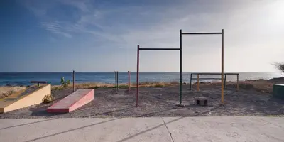 a group of basketball courts on the beach at Aparthotel Praiano in Praia