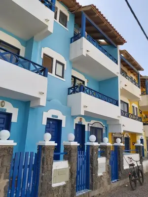 a building in positano with blue and white at Casa Azul Apt Two Rua da Morna up from Mercado Municipal 4111 in Santa Maria