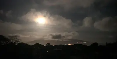 a stormy sky with the sun poking through the clouds at Villa Vicente in Vila Nova Sintra