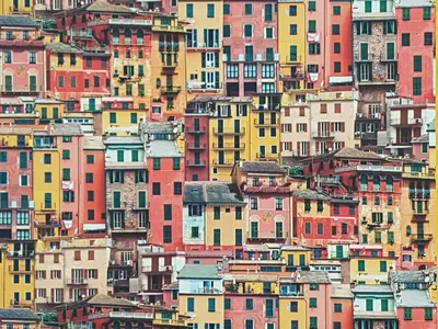 a large group of colorful houses on a hill at Casa Io - Bica in Mindelo