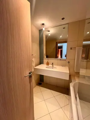 a bathroom with a sink and a mirror at Apartment in Vila Verde - Pool view - Santa Maria in Santa Maria