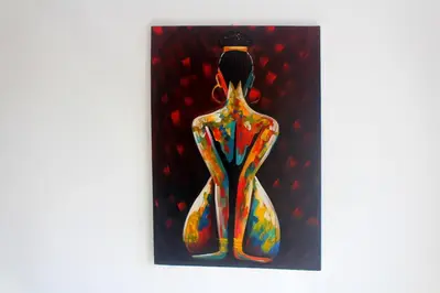 a painting of a woman in a colorful dress at Residence A Paz in Boa Ventura