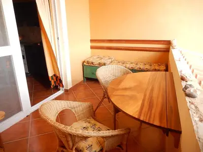 a dining room with a table and chairs at Residenz Stella Maris Apartment Strela in Vila do Maio