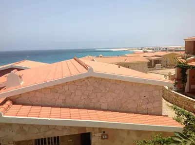 a view of a house with a tile roof at Residenz Stella Maris Apartment Strela in Vila do Maio