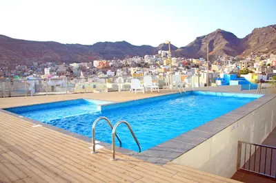 a swimming pool on the roof of a building at Apartment with pool in Mindelo in Mindelo