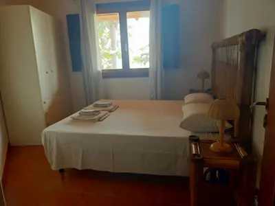 a bedroom with a bed and a window at Sal&Love apt in Porto Antigo in Santa Maria
