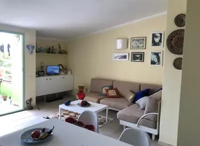 a living room with a couch and a table at More then a beautiful apart The real Morabeza Capeverdean hospitality in Santa Maria