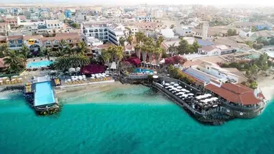 an aerial view of a resort on the beach at Apt71 Porto Antigo 2 in Santa Maria