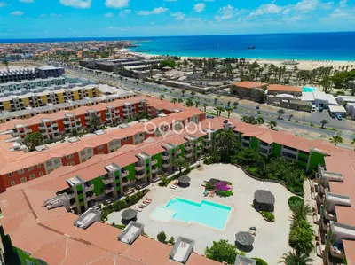 an aerial view of a resort with a swimming pool at Djadsal Moradias - by Bobbywashere in Santa Maria