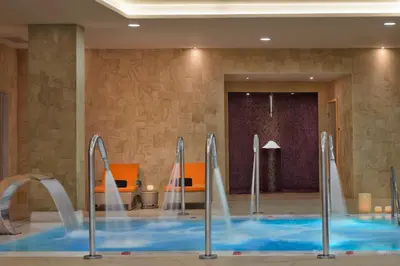 a swimming pool with water fountains in a hotel room at Melia Dunas Beach Resort & Spa - All Inclusive in Santa Maria