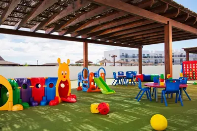 a childrens play area with a table and chairs at Melia Dunas Beach Resort & Spa - All Inclusive in Santa Maria