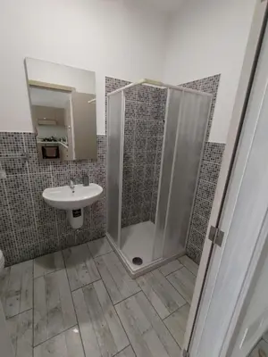 a bathroom with a shower and a sink at Rosa dei Venti Apartment 50meter beach front in Sal Rei