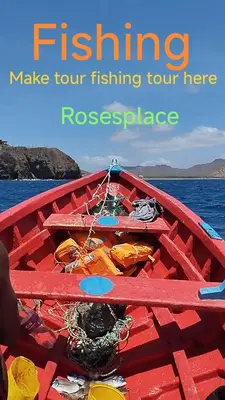 a red boat on the water with the words fishing make your fishing your residence at Rose`s place in Mindelo