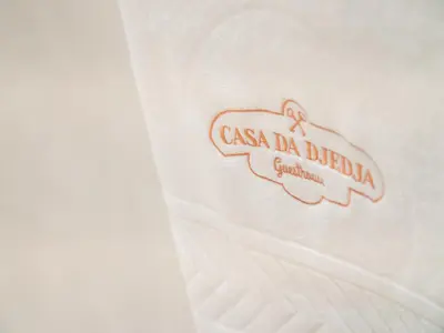 a close up of a label on a white shirt at Casa da Djedja in Mindelo