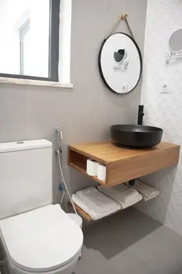 a bathroom with a sink and a toilet at Urban Sal Loft in Espargos