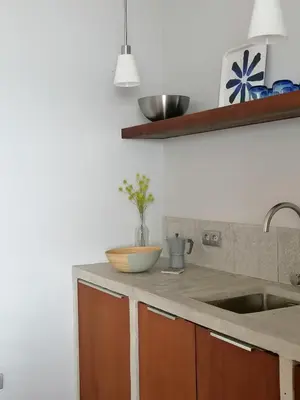 a kitchen with a sink and a bowl on the counter at Villa Pescadora spectacular view, luxery fisherhouse design in Sal Rei